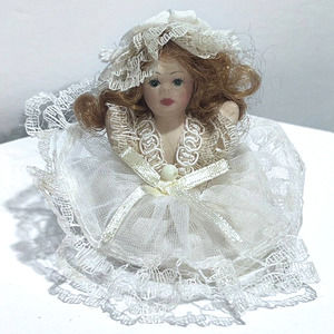 Vintage Ceramic Bisque Miniature Sitting Victorian Dressed Doll 2.5"